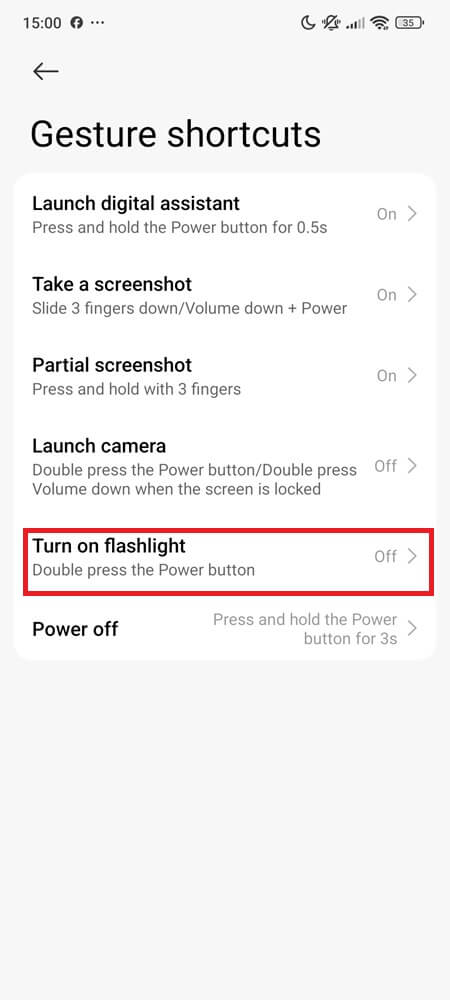 'Gesture shortcuts' menu showing the 'Turn on flashlight' option with Power button trigger 'Gesture shortcuts' menu showing the 'Turn on flashlight' option with Power button trigger