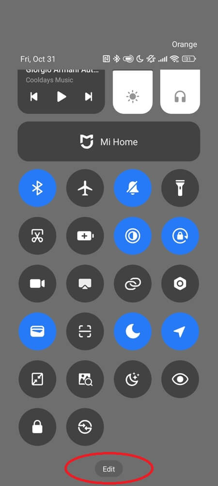 Quick Settings panel with the Edit button highlighted Quick Settings panel with the Edit button highlighted