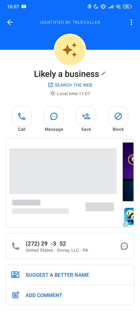 Smartphone screen with caller ID showing likely a business
